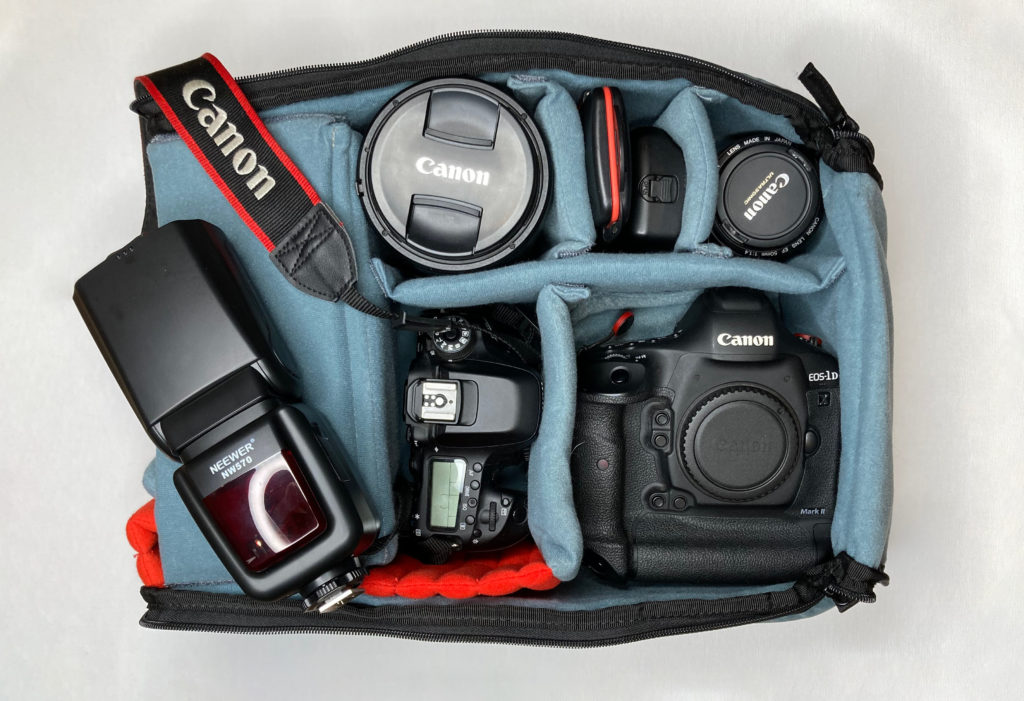 Photography tools packed away in Brevite Camera Backpack